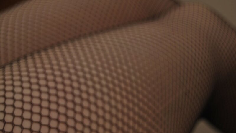 close-up of fishnet stockings