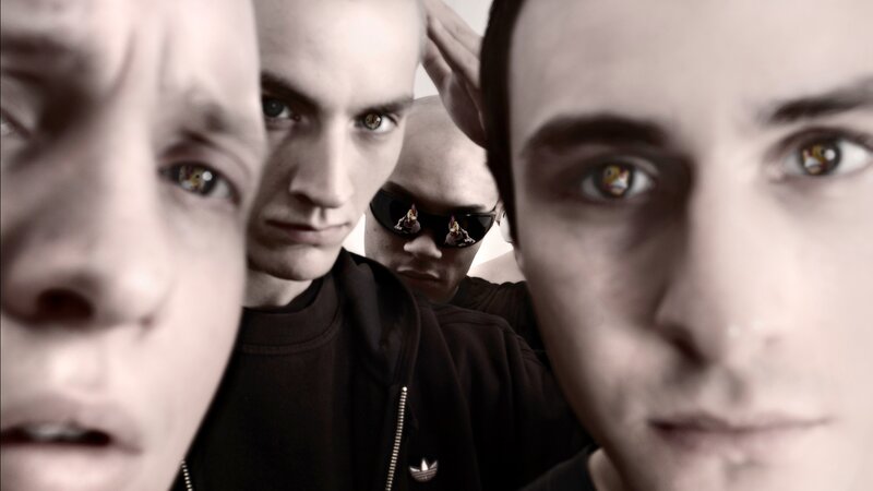 close-up of four men
