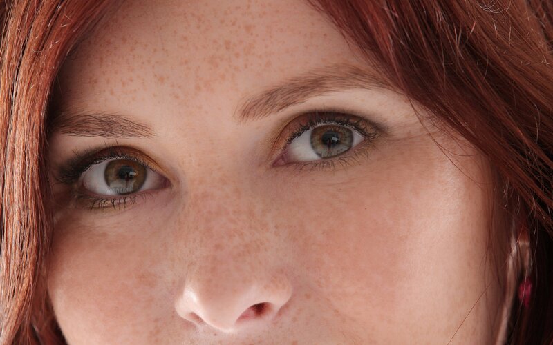 close-up of freckled face