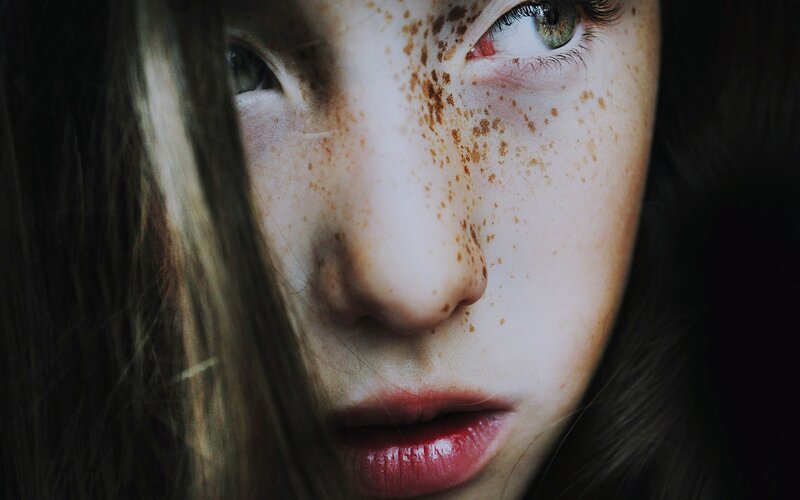 close-up of freckled face