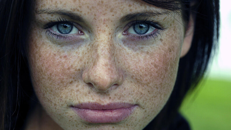 close-up of freckled face
