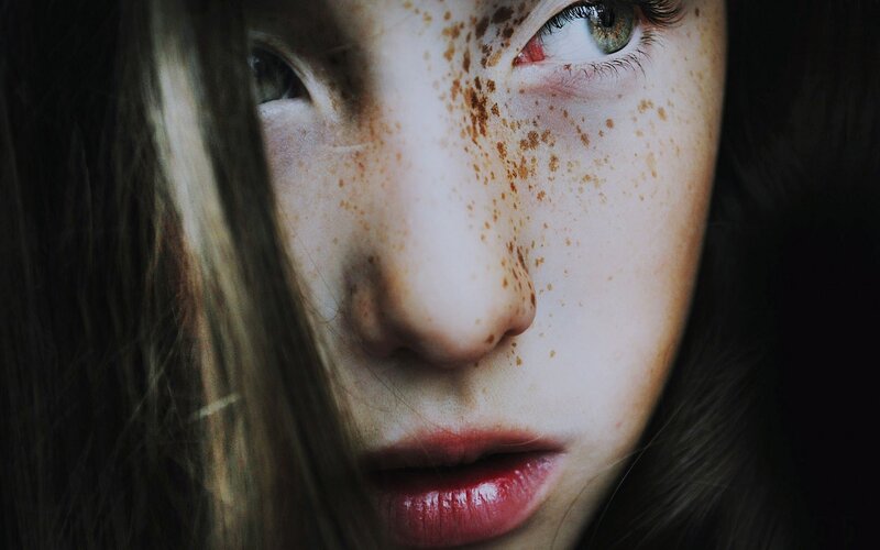 close-up of freckled face