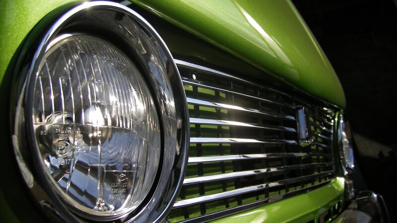 close-up of green car headlight