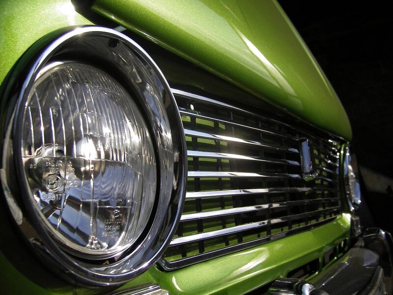 Close-up of green car headlight