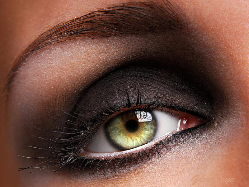 close-up of green eye with makeup