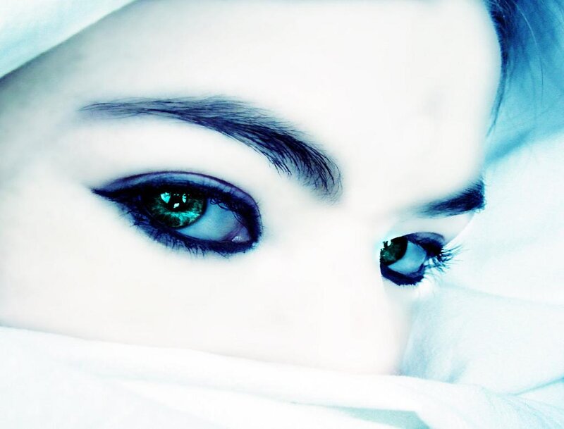 Close-up of Green Eyes — White