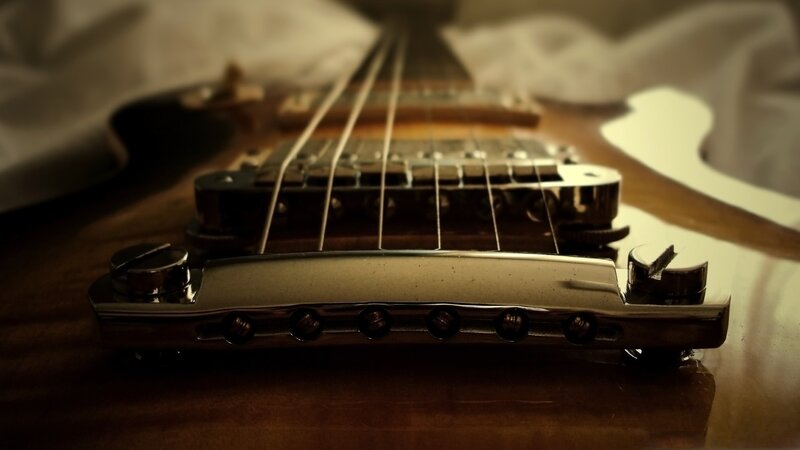 close-up of guitar bridge