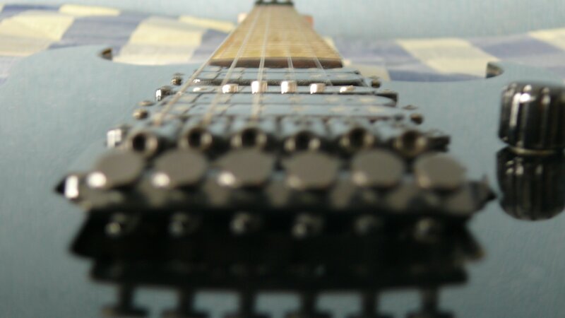 close-up of guitar bridge