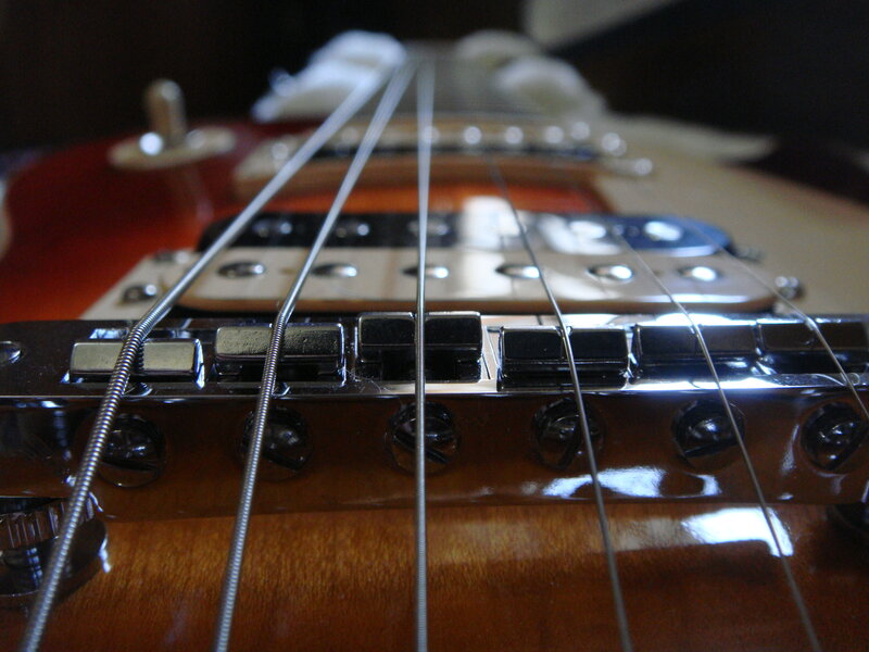 close-up of guitar bridge