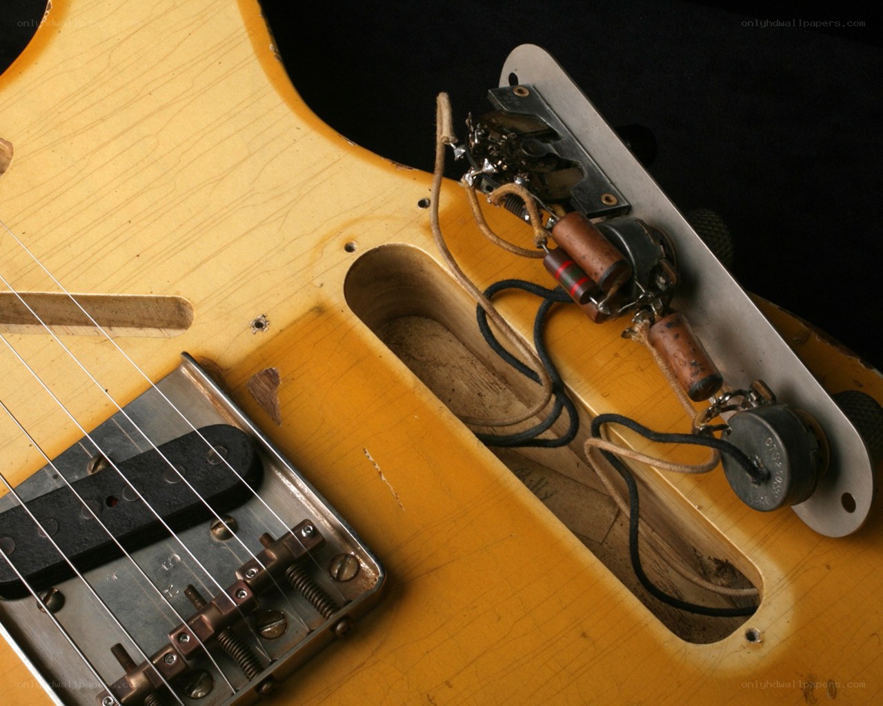 close-up of guitar electronics