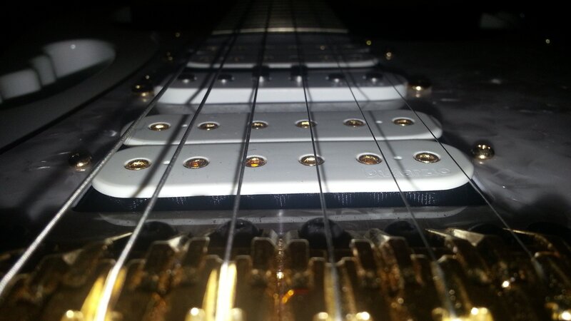 close-up of guitar pickups