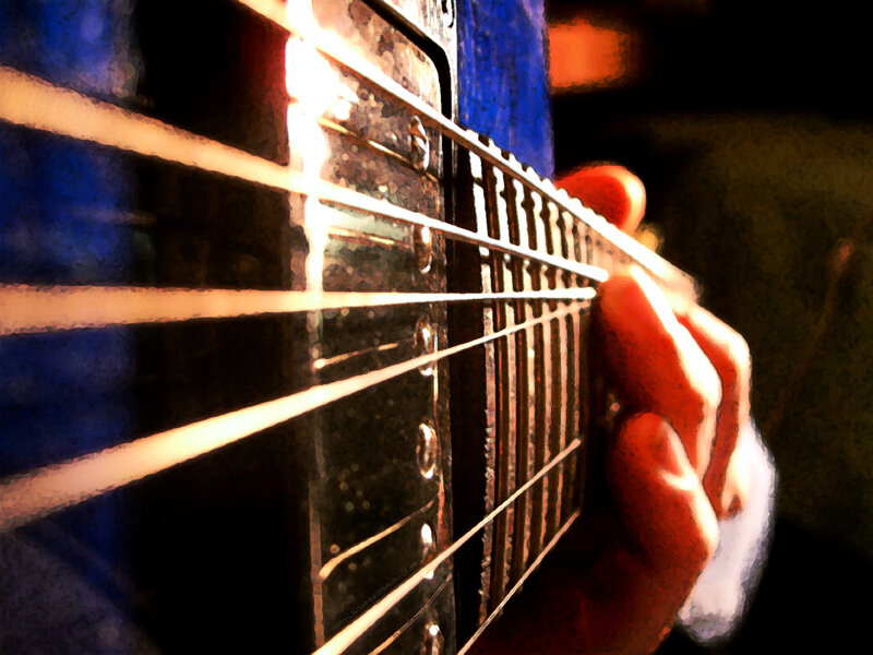 close-up of guitar playing