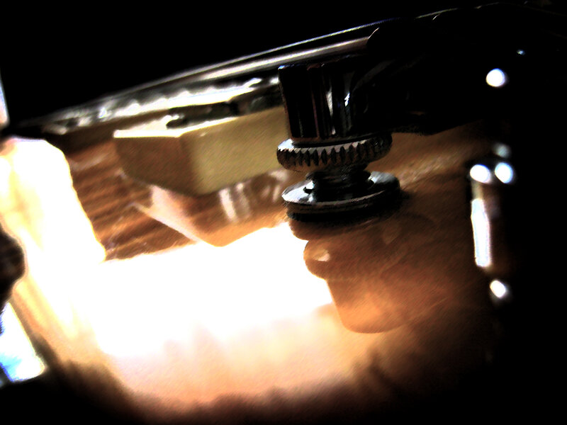 close-up of guitar tuning peg