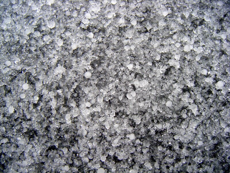 Close-up of hailstones on ground