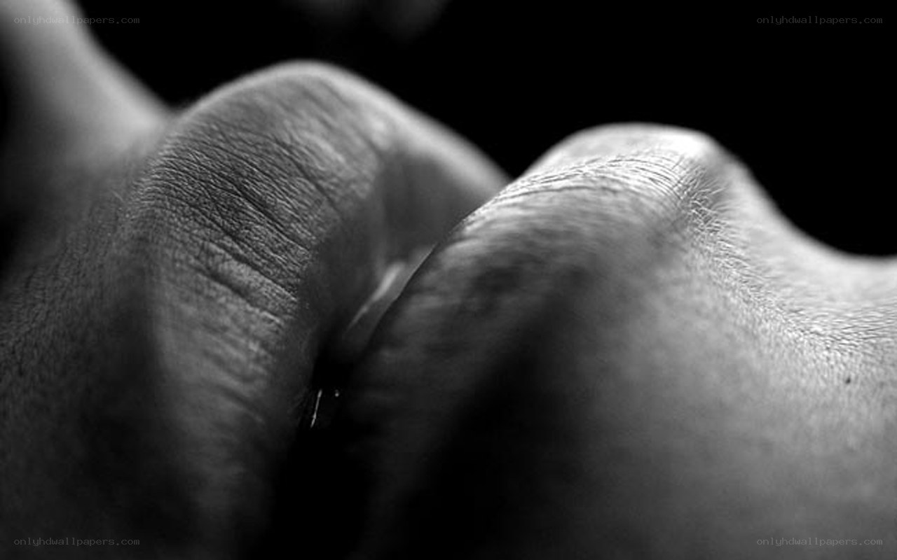 close-up of hands in shadow