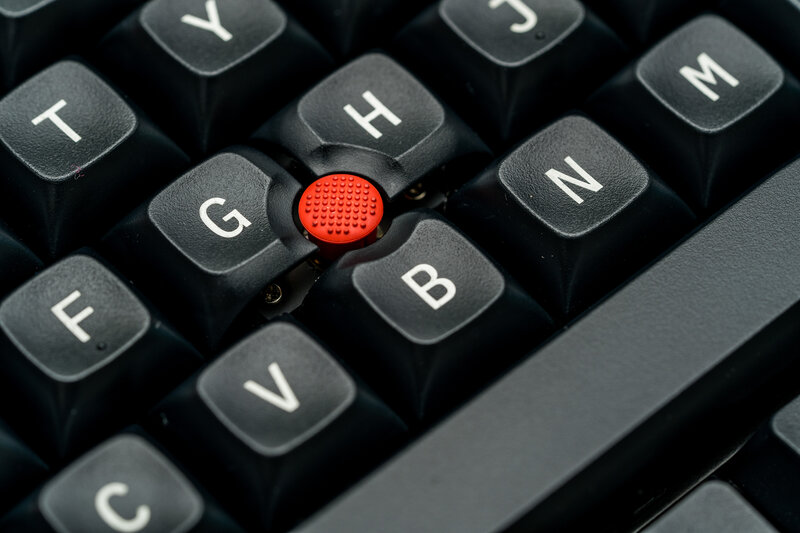 Close-up of Keyboard Keys — Black, Neutral, Photograph, Red Scroll Wheel