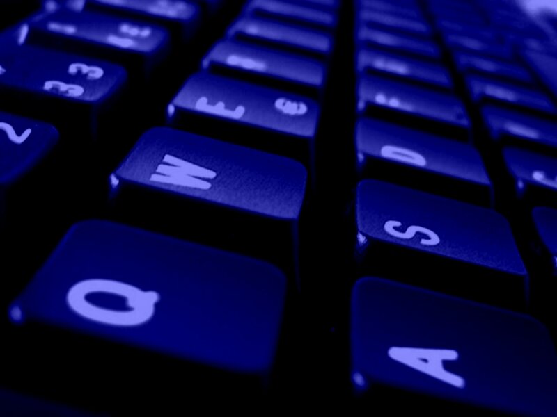 Close-up of Keyboard Keys — Blue, Dark