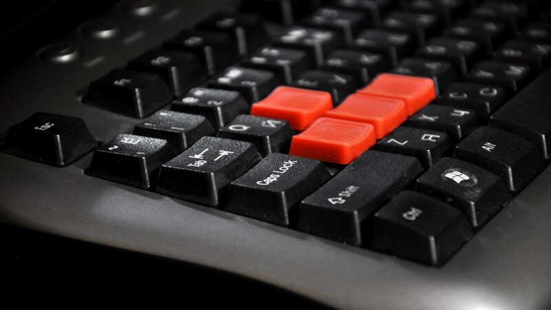 close-up of keyboard with red keys