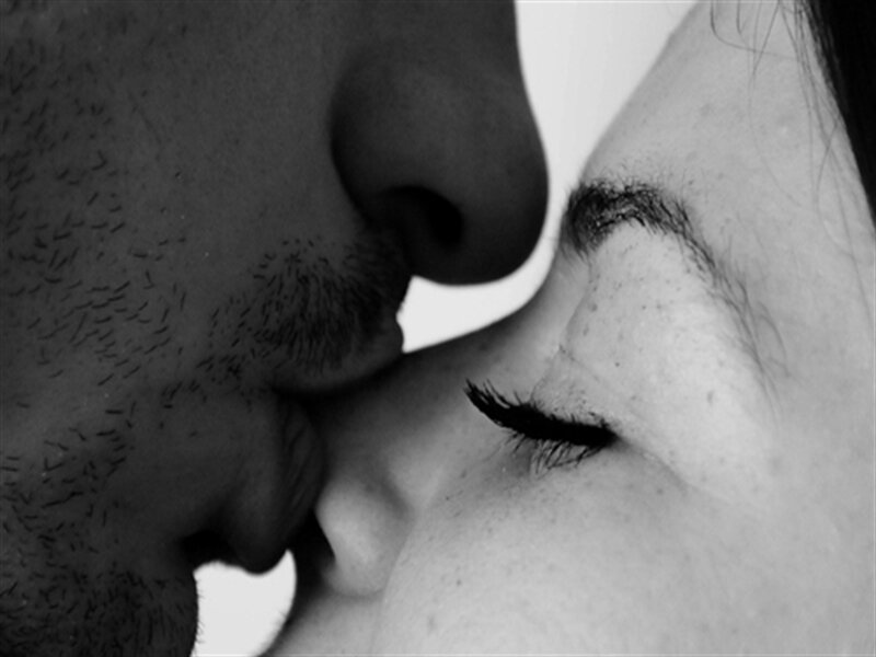 Close-up of Kissing Couple — Black