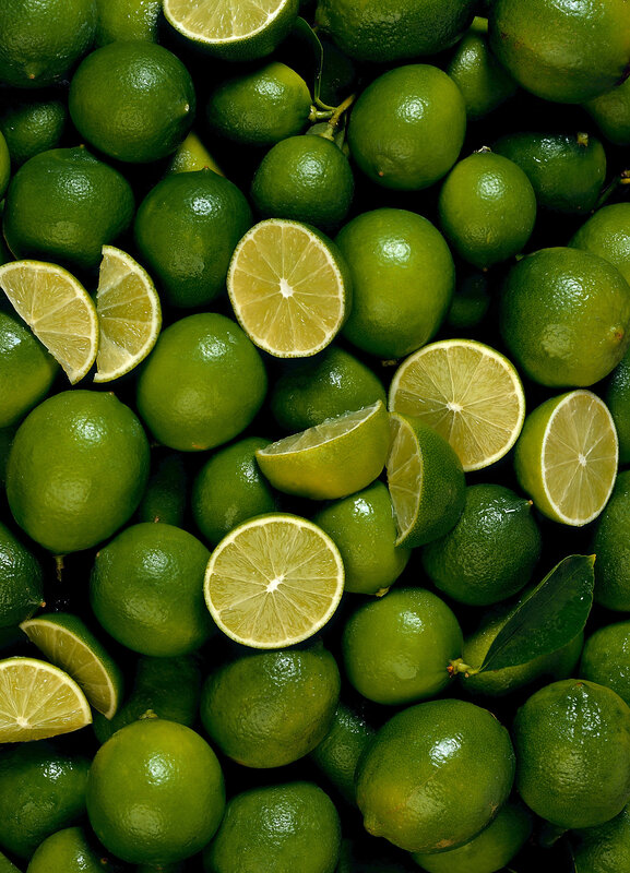Close-up of limes and lime slices