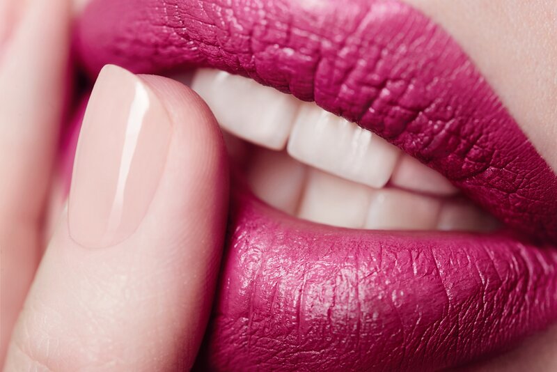 Close-up of Lips and Finger — Pink, Dramatic