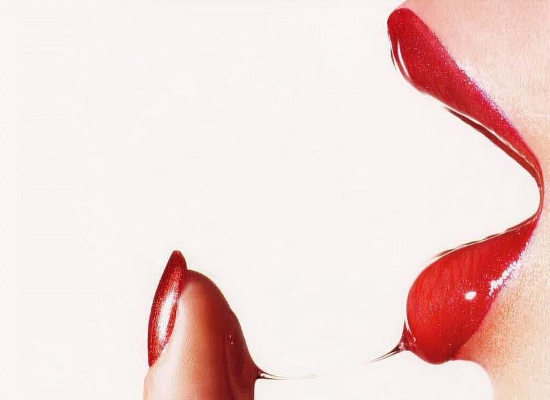 Close-up of Lips and Finger — Red