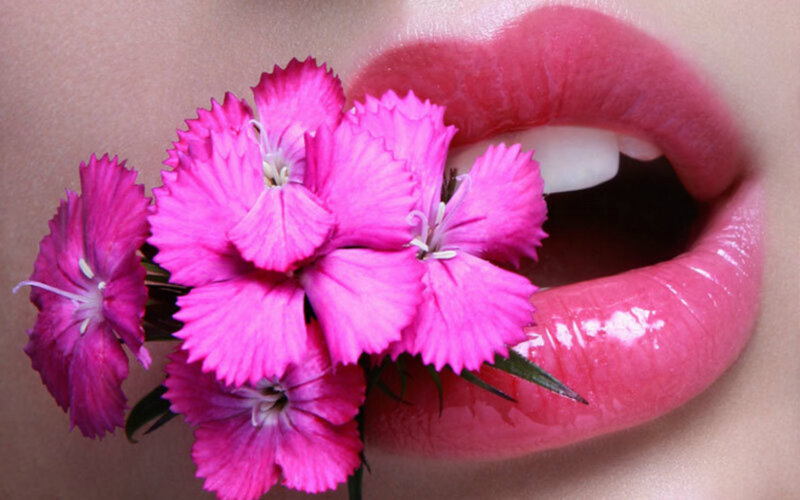 Close-up of Lips and Flowers — Pink