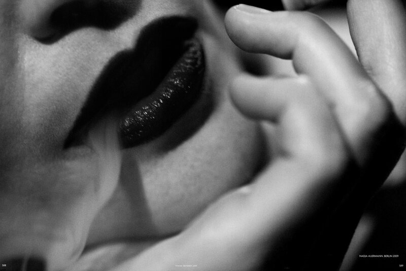 close-up of lips and hand