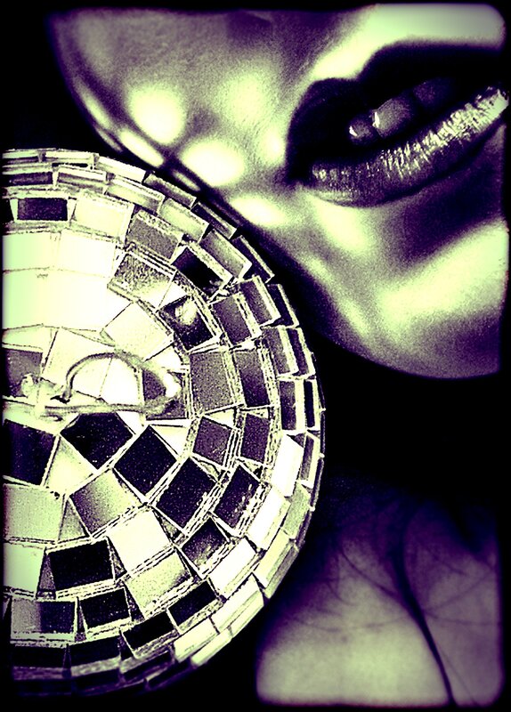 close-up of lips and mirror ball