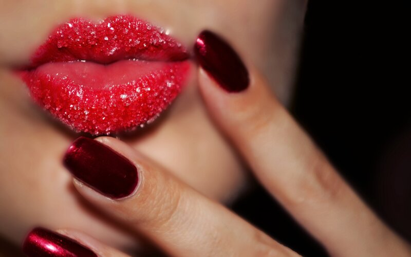 Close-up of Lips and Nails — Red