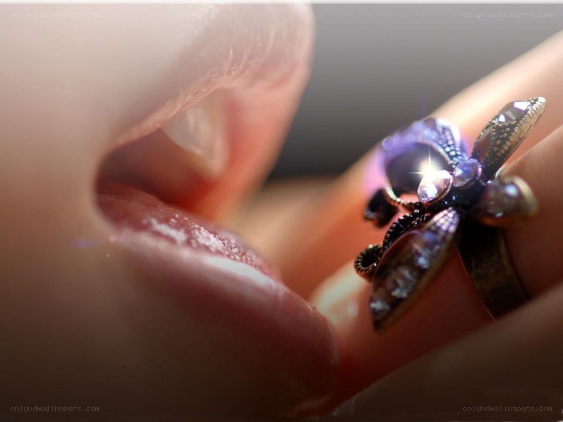 close-up of lips and ring