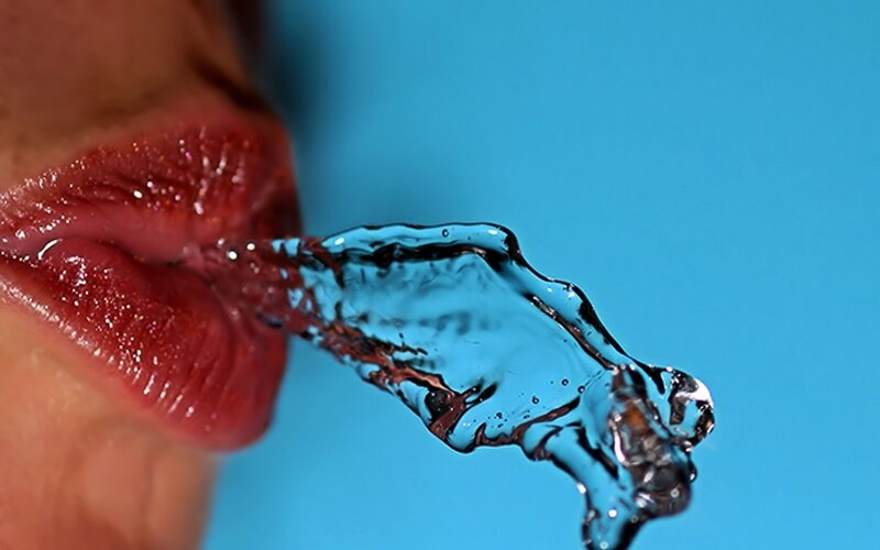 Close-up of Lips and Water