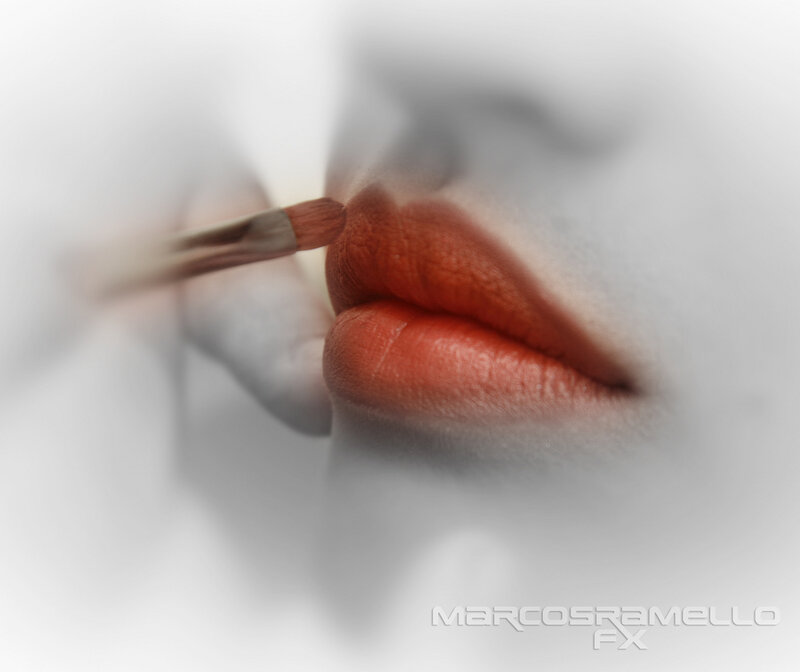Close-up of Lips Being Painted