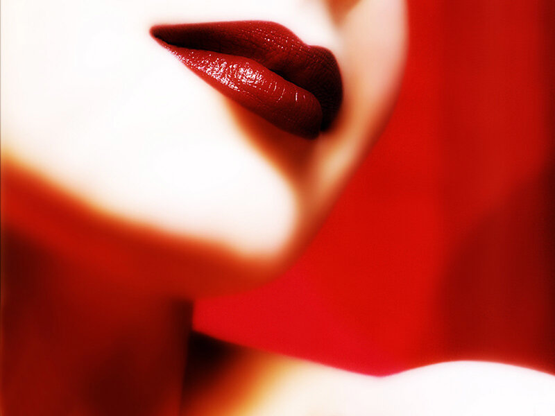Close-up of Lips — Red Background
