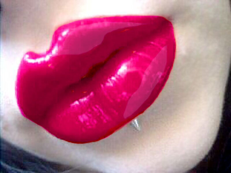 close-up of lips with bright lipstick