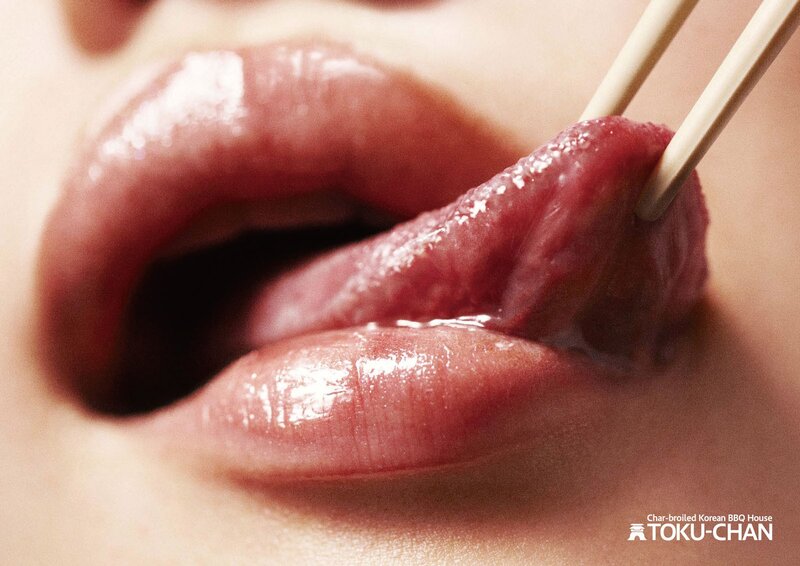 close-up of lips with chopsticks