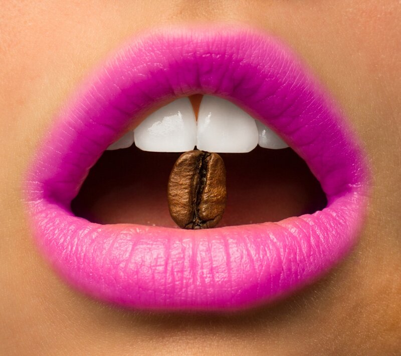 Close-up of Lips with Coffee Bean