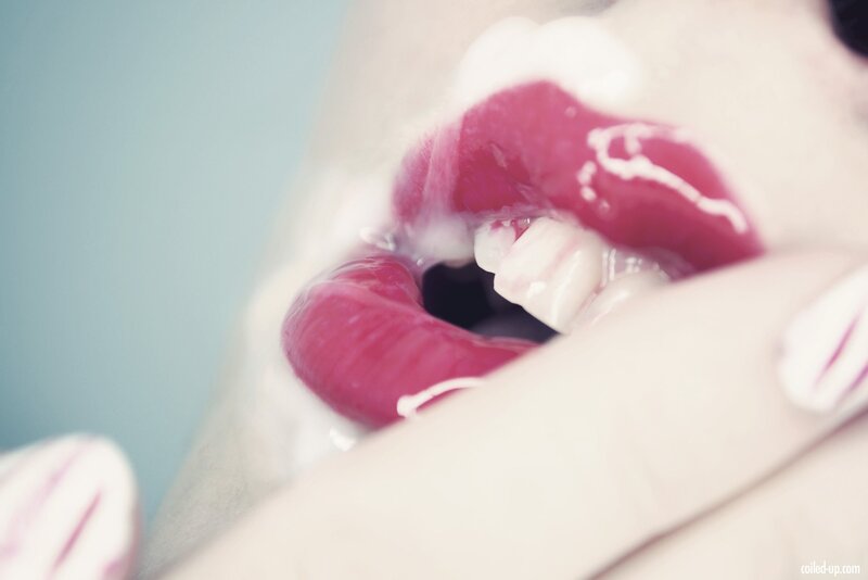 close-up of lips with cream
