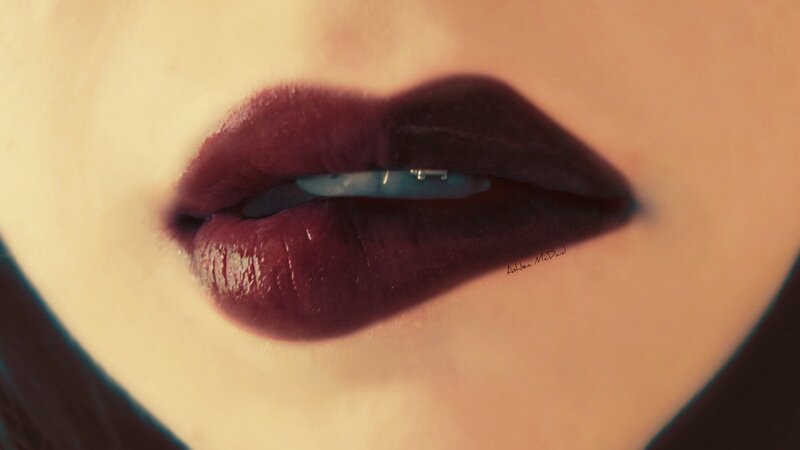 close-up of lips with dark lipstick