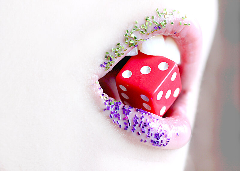 Close-up of Lips with Dice