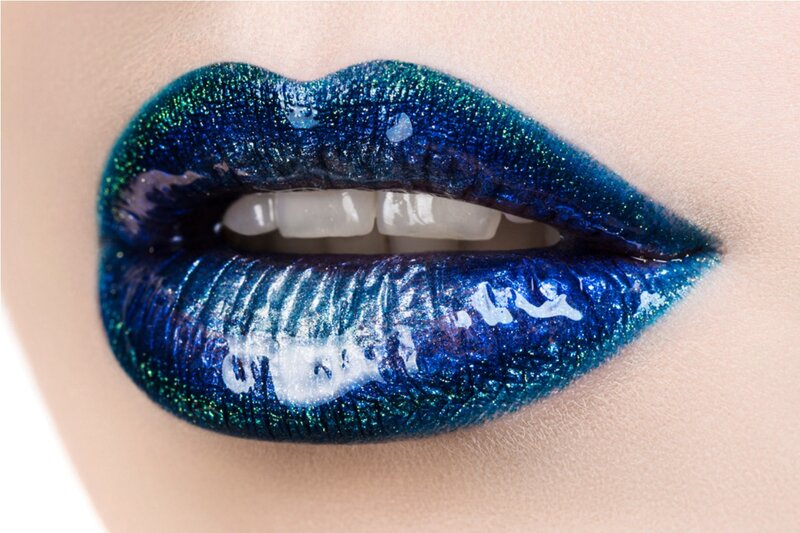 Close-up of Lips with Glitter — Blue