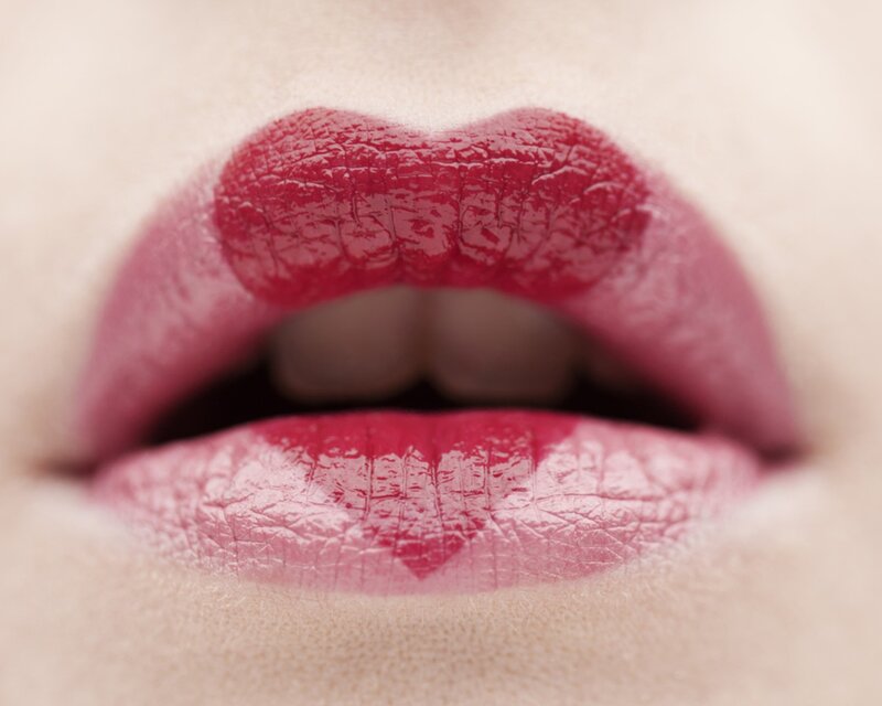 close-up of lips with heart shape