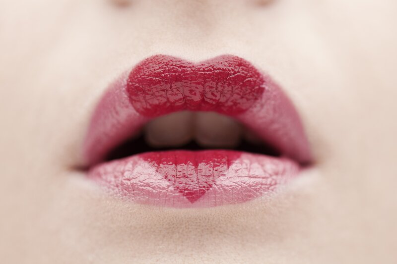 close-up of lips with heart shape