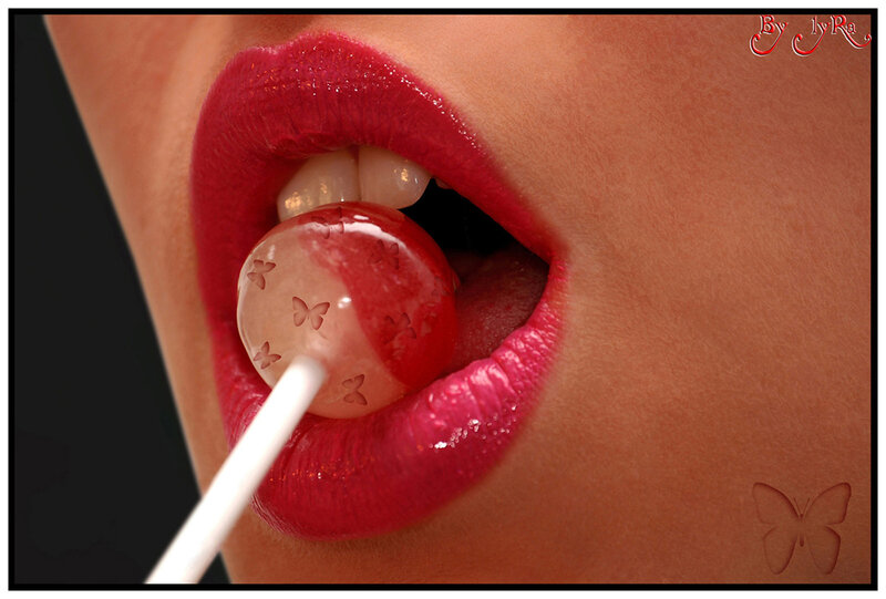 close-up of lips with lollipop