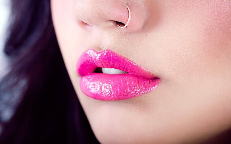 close-up of lips with pink lipstick