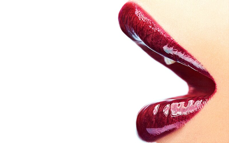 close-up of lips with red lipstick