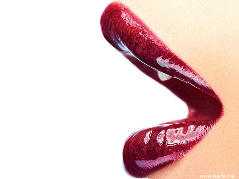 close-up of lips with red lipstick