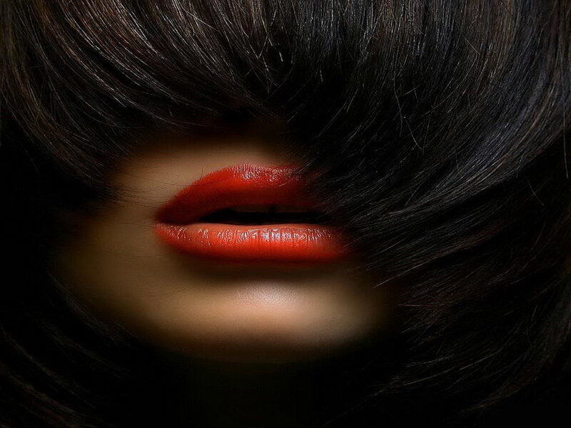 close-up of lips with red lipstick
