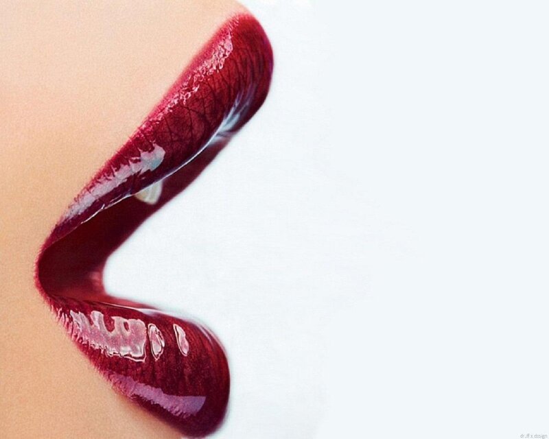 close-up of lips with red lipstick