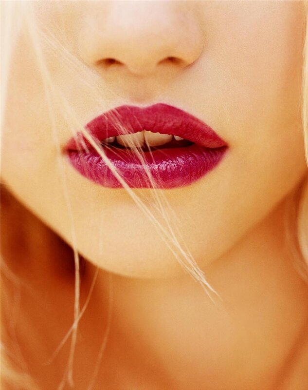 close-up of lips with red lipstick